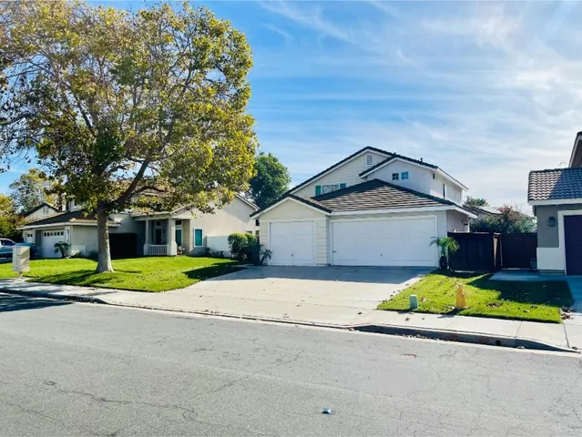 a house view with a outdoor space