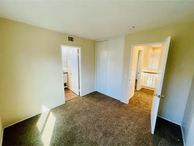 a living room with a rug