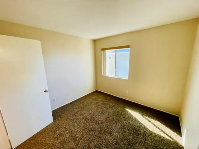 a view of wooden floor and a sink