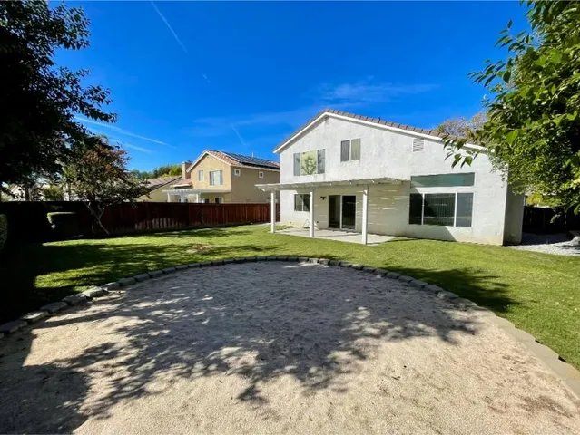a view of garden with patio