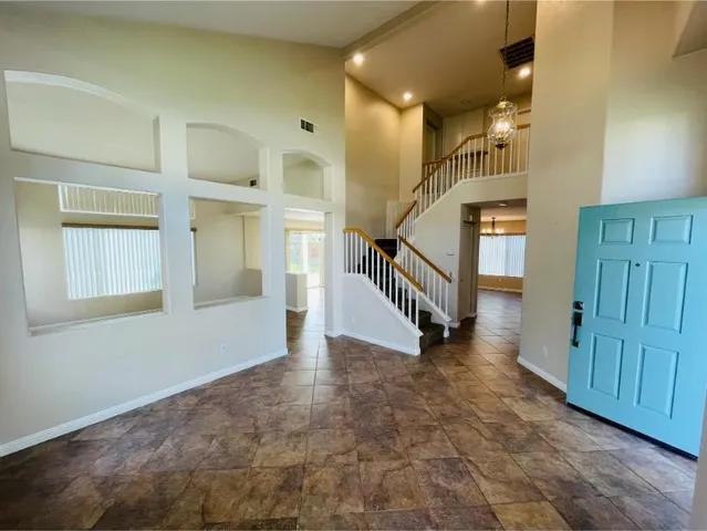 a view of entryway with a front door