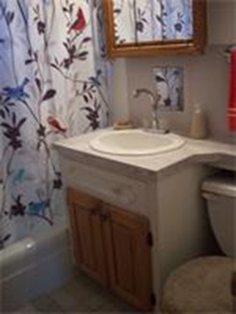 101 Sylvan Street Springfield, MA 01108 - Photo 22 of 29 a bathroom with a sink and mirror