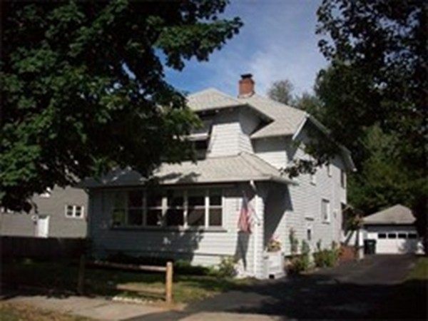 101 Sylvan Street Springfield, MA 01108 - Photo 3 of 29 a front view of a house with a yard