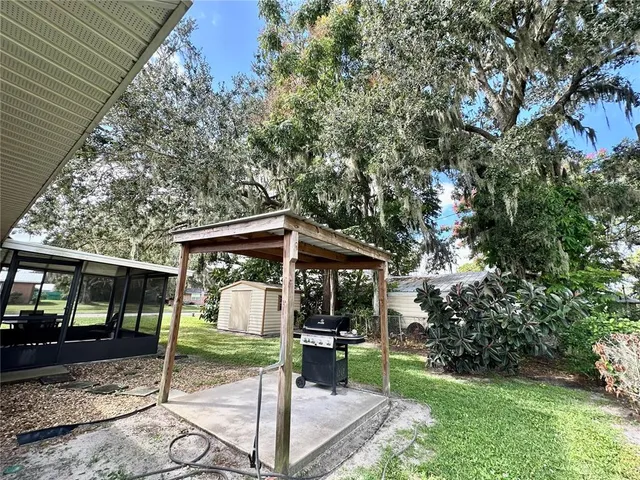 a view of a backyard with a garden