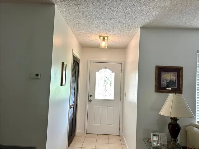 a view of livingroom with furniture and a window