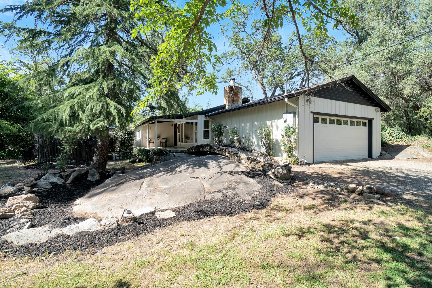 6299 Horseshoe Bar Road Loomis, CA 95650 - Photo 32 of 43 a view of a house with a yard covered in snow
