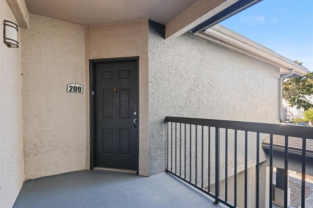 8513 Lucuya Way, Unit 209 Temple Terrace, FL 33637 - Photo 3 of 21 a view of a hallway