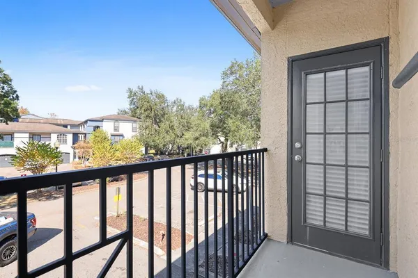 a view of a balcony with an outdoor space