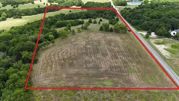 a view of swimming pool with a yard