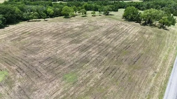 a view of a backyard of a house