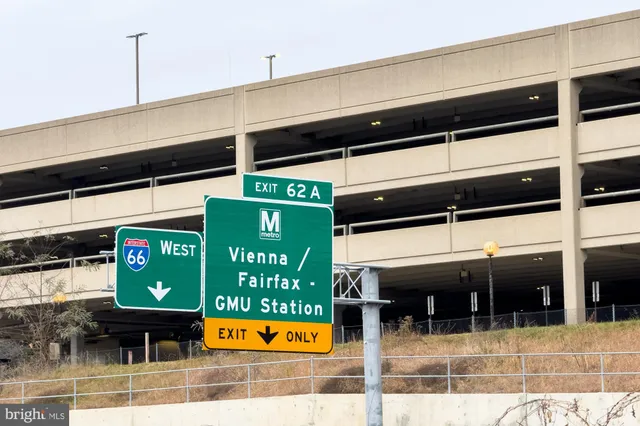 a view of a patio with a table and chairs