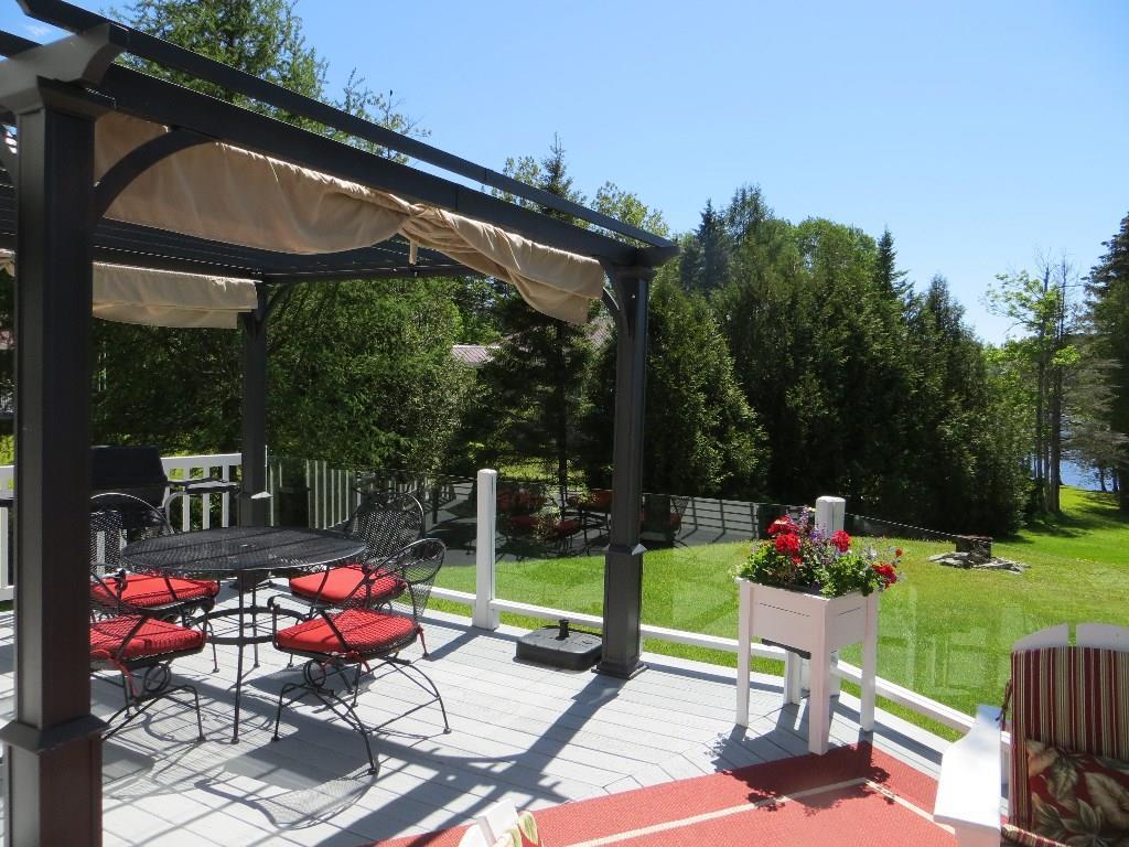 1621 Sly Brook Road Eagle Lake, ME 04739 - Photo 5 of 35 Pergola to enjoy the views of the lake!