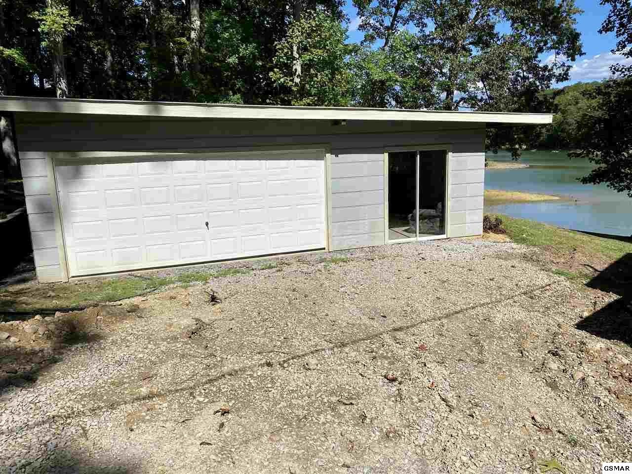 2124 Key Way Sevierville, TN 37876 - Photo 21 of 29 a front view of a house with a yard