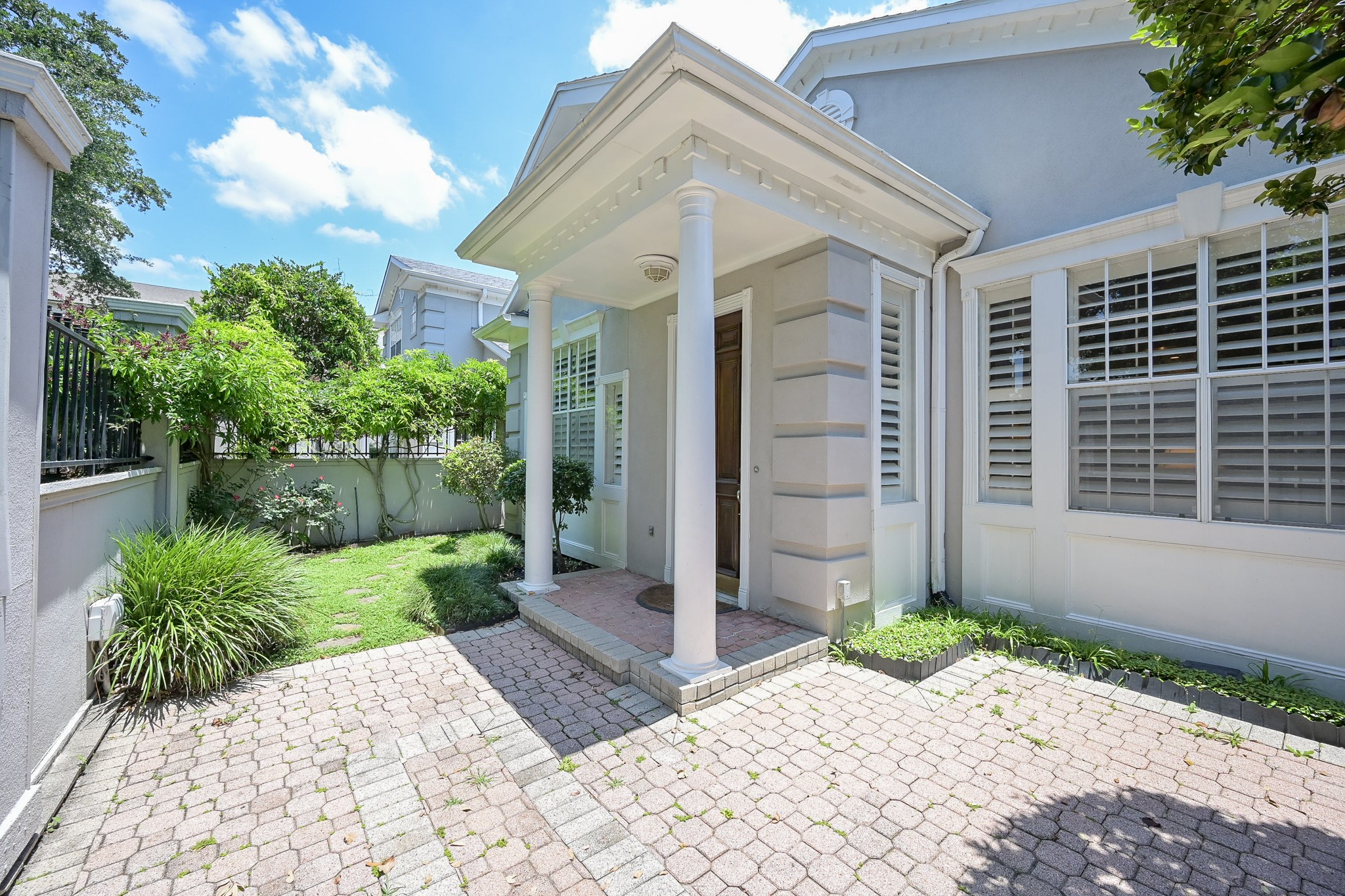 2301 Steel Street Houston, TX 77098 - Photo 2 of 34 Private court yard in the front after entering the gate.