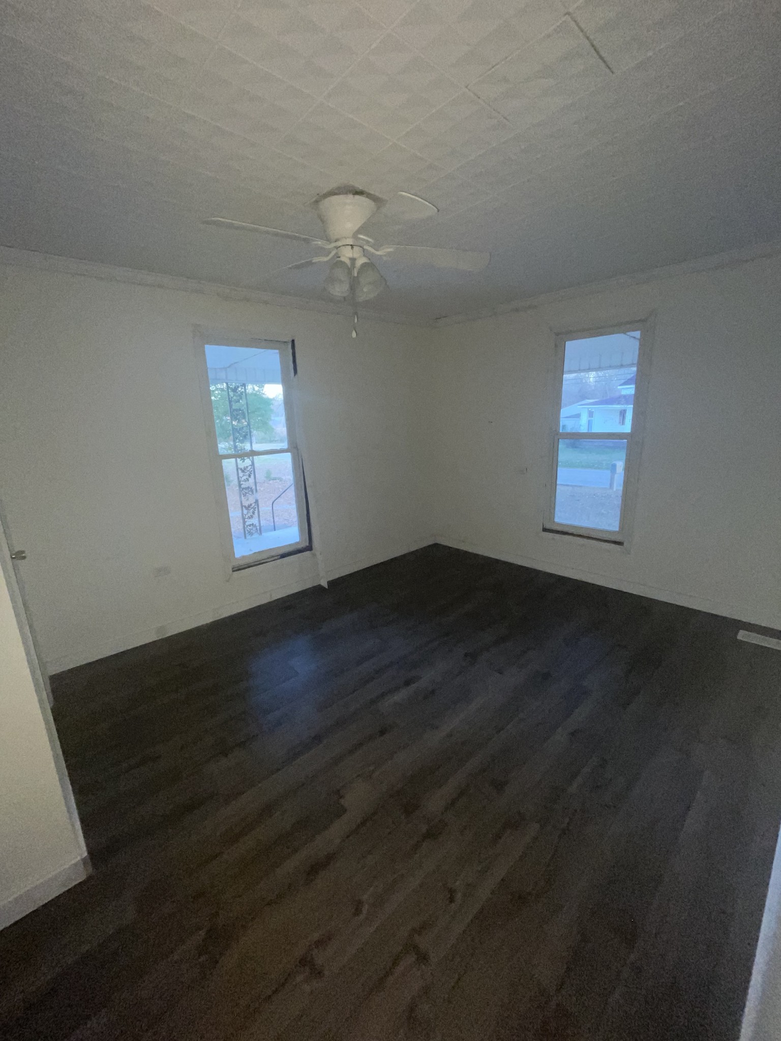 512 McKnight Street Rutherford, TN 38369 - Photo 12 of 17 an empty room with wooden floor and windows