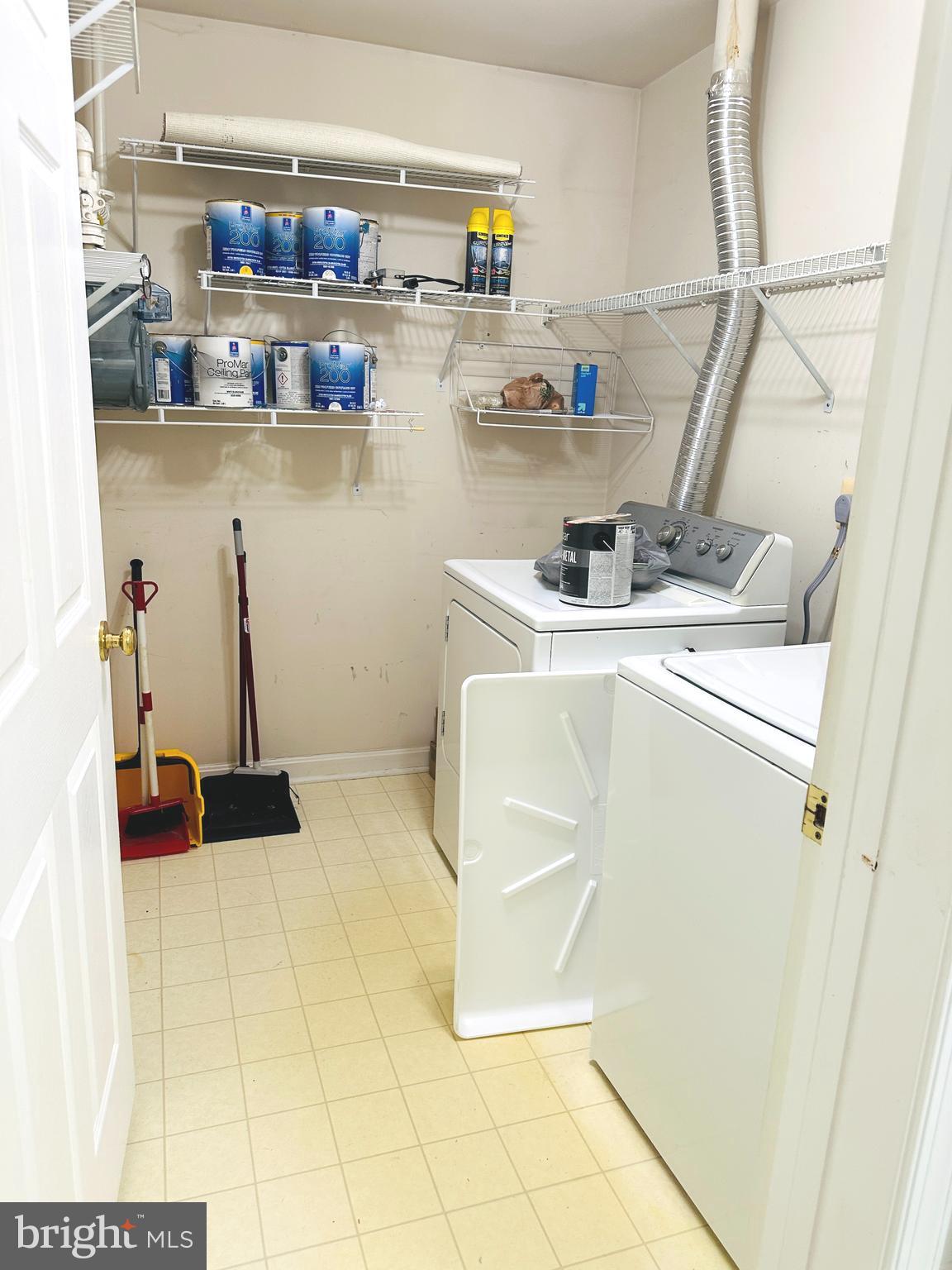 115 Timberbrook Lane, Unit 102 Gaithersburg, MD 20878 - Photo 19 of 20 a room with storage and utility