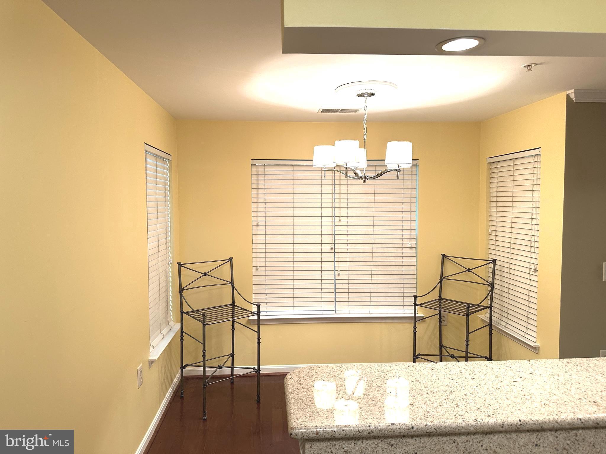 115 Timberbrook Lane, Unit 102 Gaithersburg, MD 20878 - Photo 8 of 20 a view of a swimming pool and outdoor space