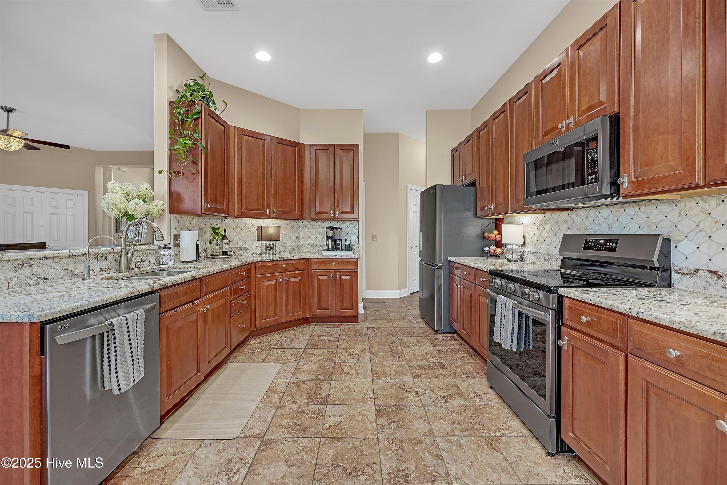 1226 Atrium Way Leland, NC 28451 - Photo 12 of 62 Kitchen