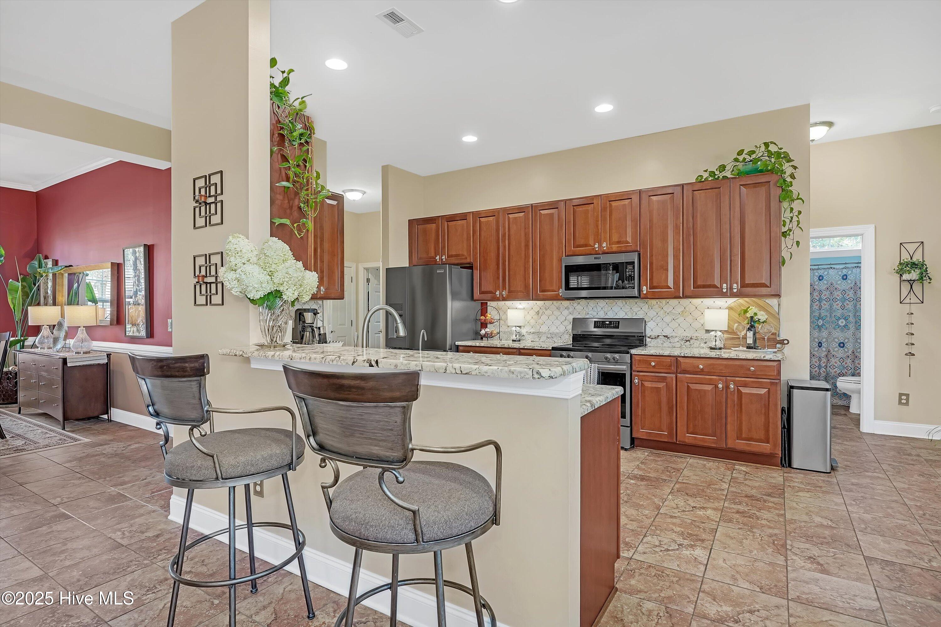 1226 Atrium Way Leland, NC 28451 - Photo 16 of 62 Kitchen