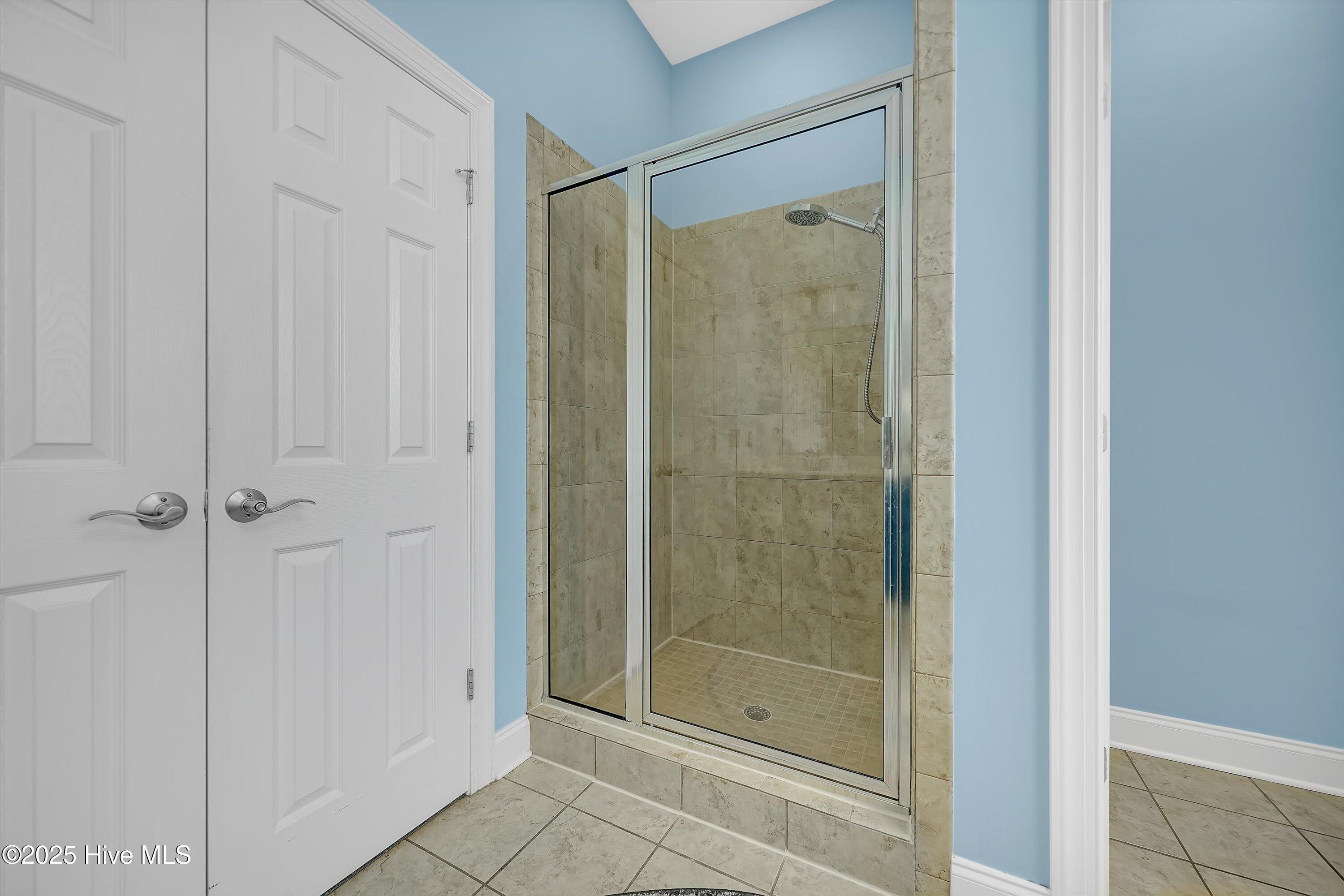 1226 Atrium Way Leland, NC 28451 - Photo 20 of 62 Primary Bathroom-tile shower