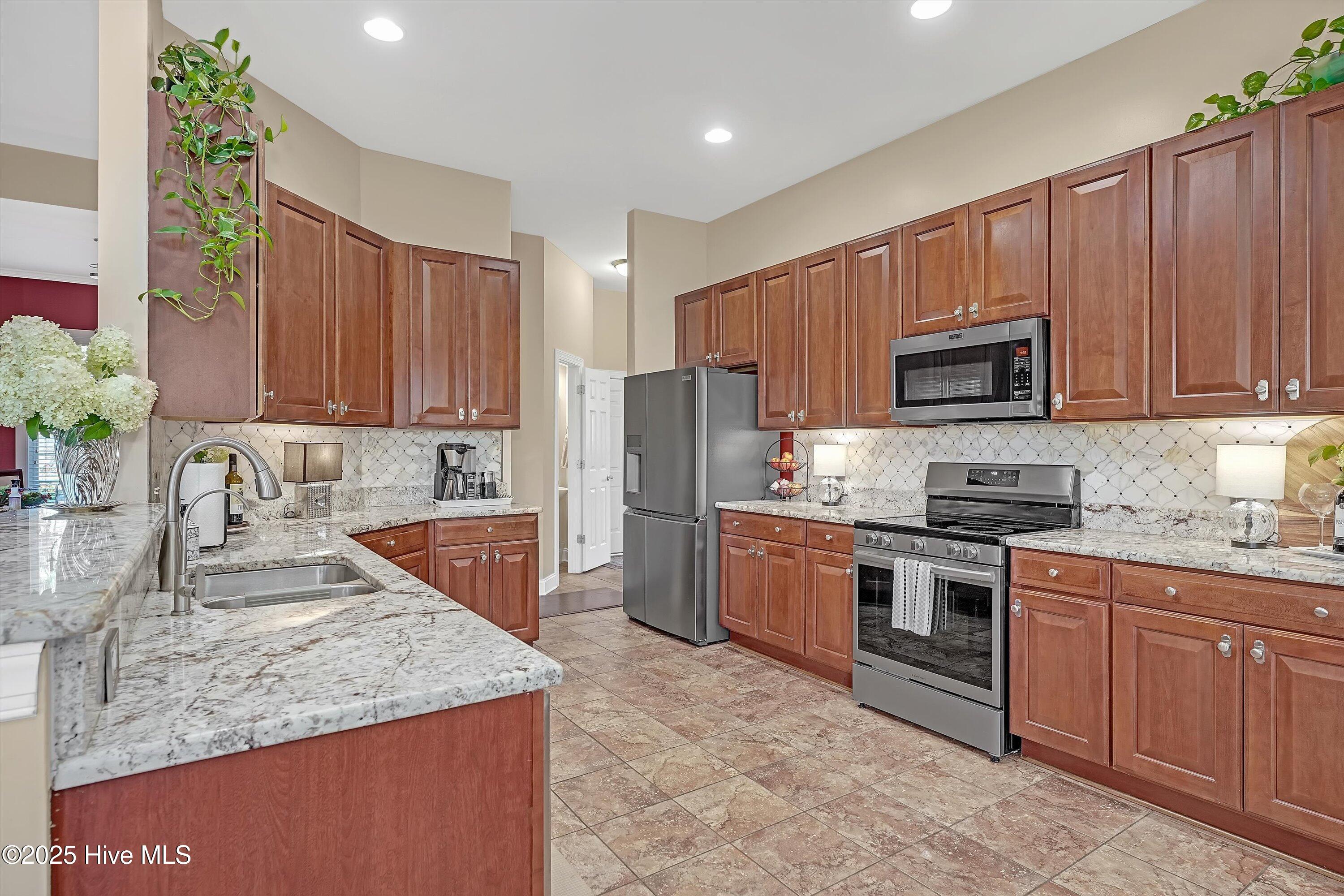 1226 Atrium Way Leland, NC 28451 - Photo 5 of 62 Kitchen