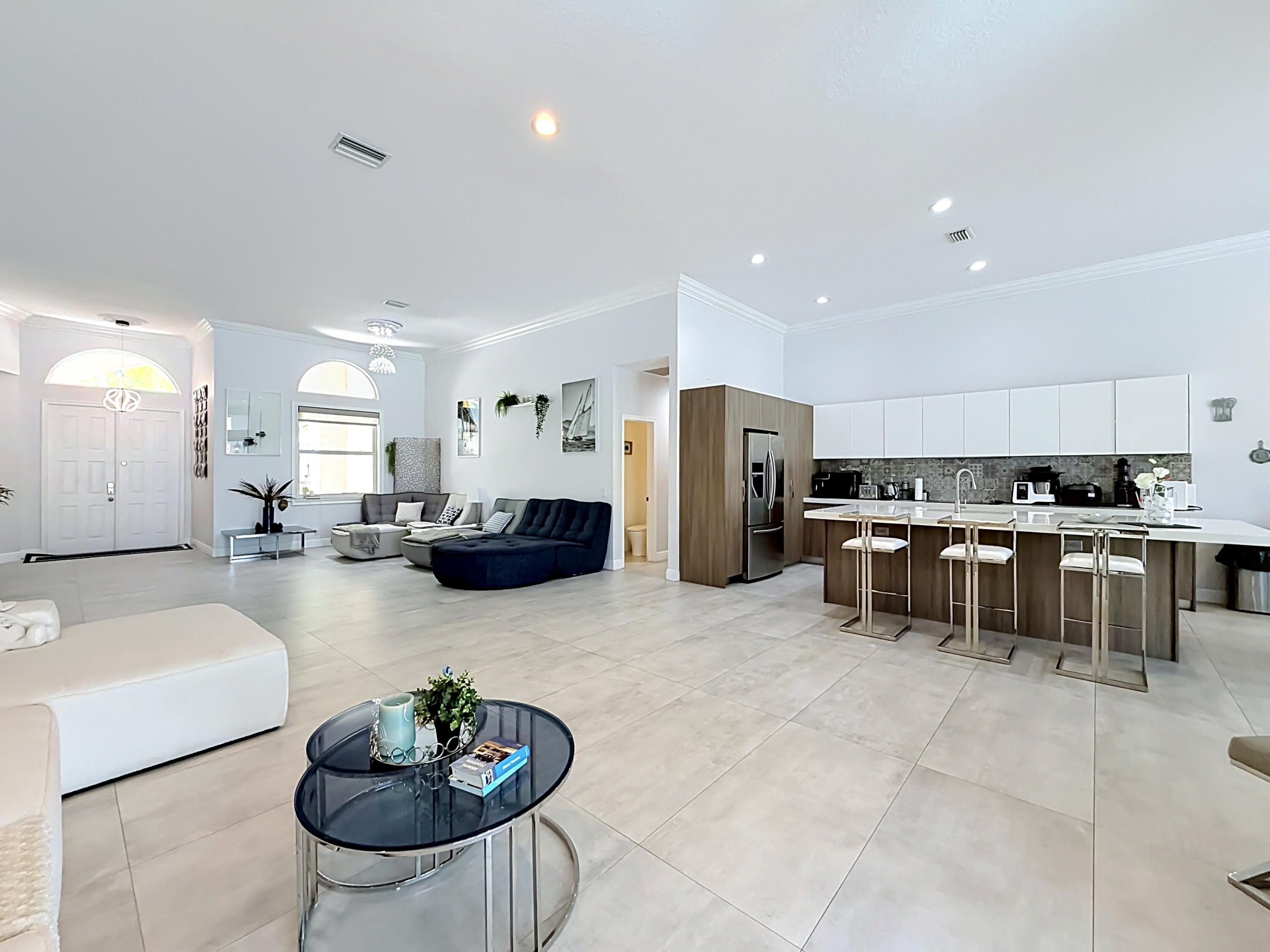 3836 Heron Ridge Lane Weston, FL 33331 - Photo 13 of 71 a living room with furniture kitchen view and a table