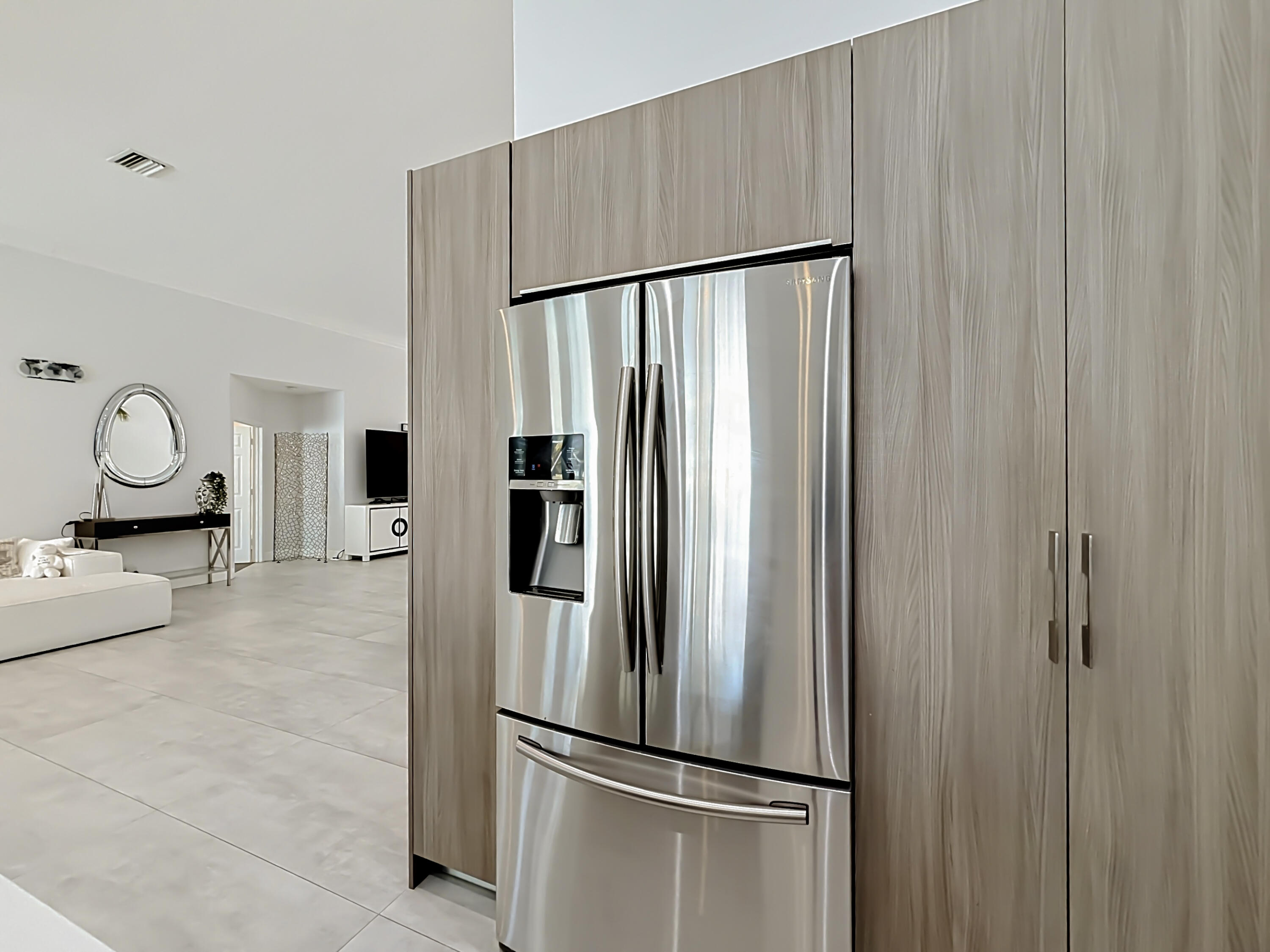 3836 Heron Ridge Lane Weston, FL 33331 - Photo 18 of 71 a kitchen with stainless steel appliances granite countertop a refrigerator and a stove top oven