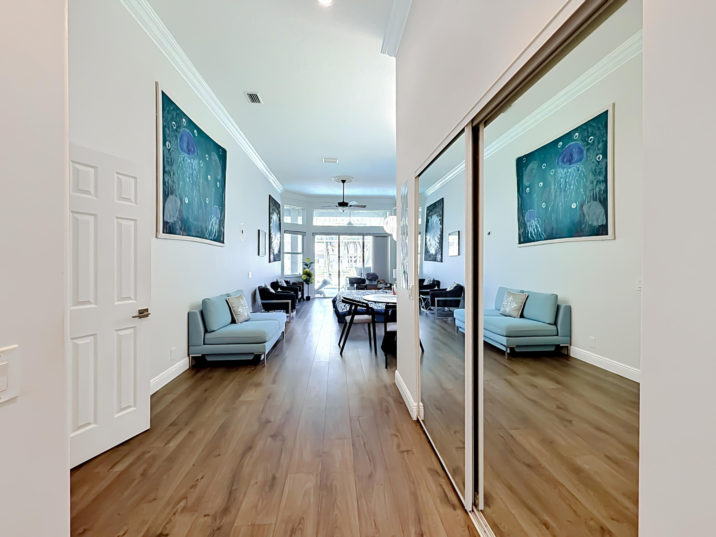 3836 Heron Ridge Lane Weston, FL 33331 - Photo 27 of 71 a living room with furniture and a wooden floor