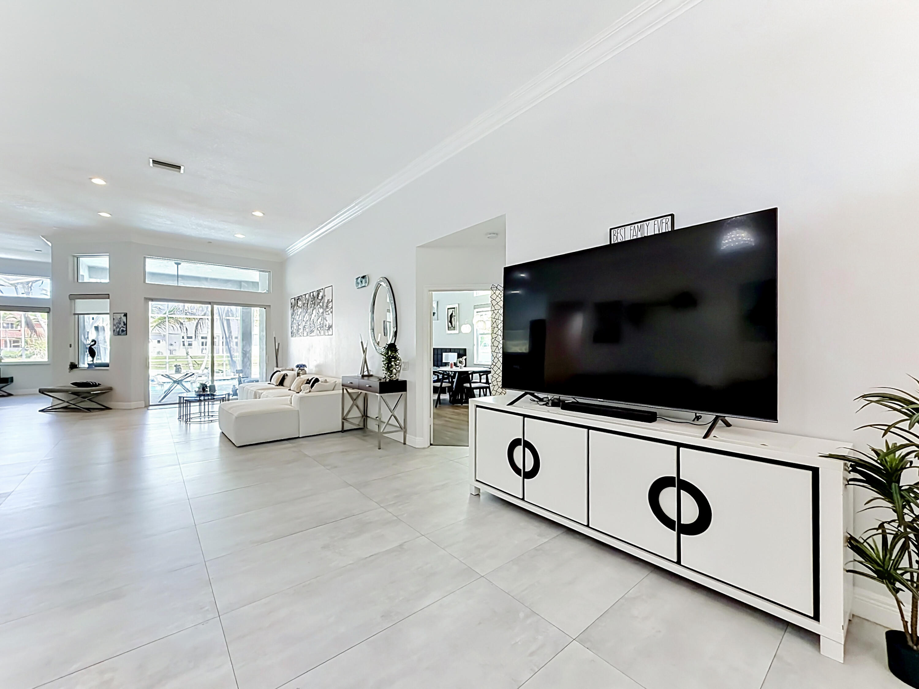 3836 Heron Ridge Lane Weston, FL 33331 - Photo 3 of 71 a living room with furniture and a flat screen tv