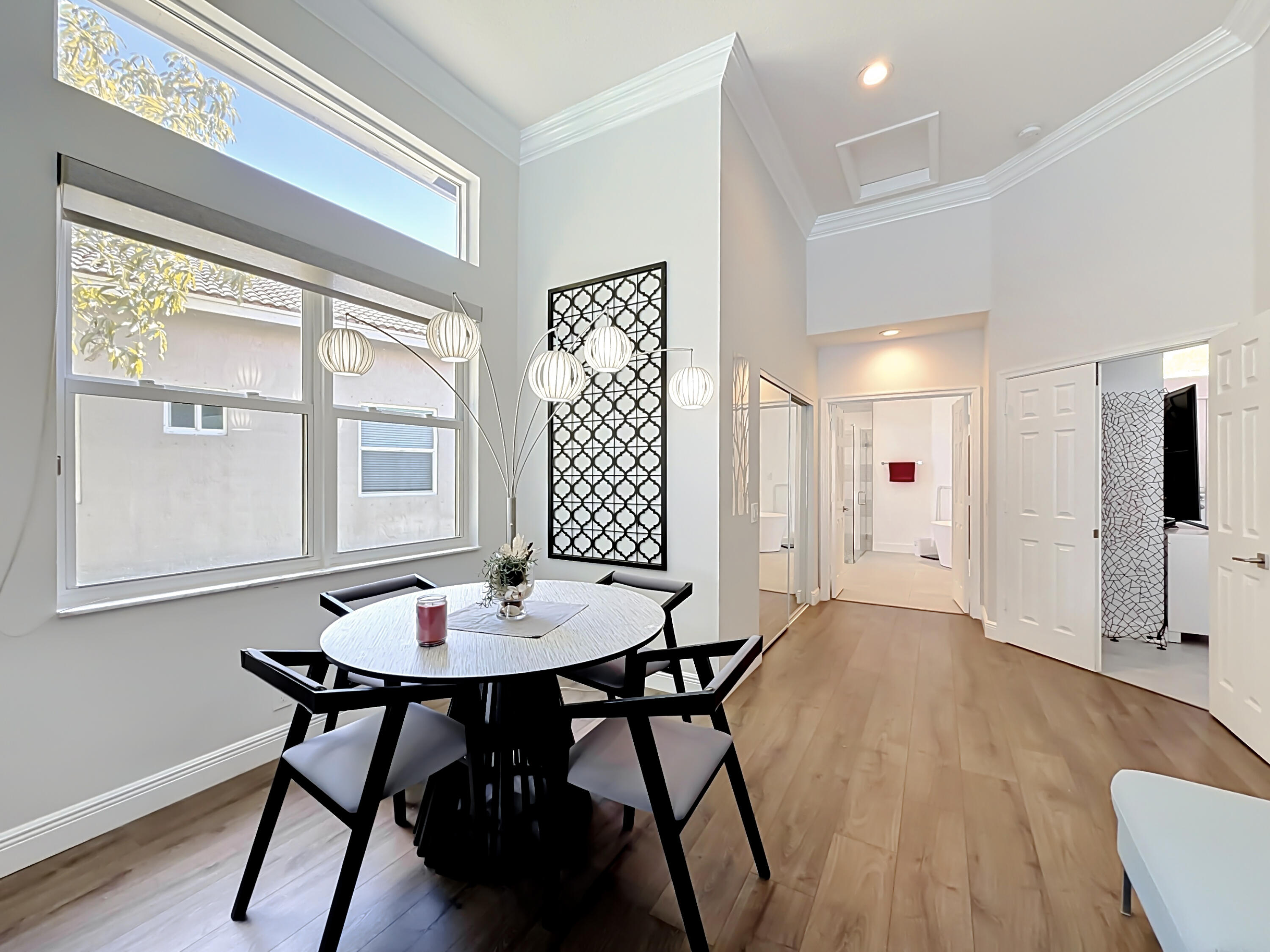 3836 Heron Ridge Lane Weston, FL 33331 - Photo 32 of 71 a view of a dining room with furniture and wooden floor