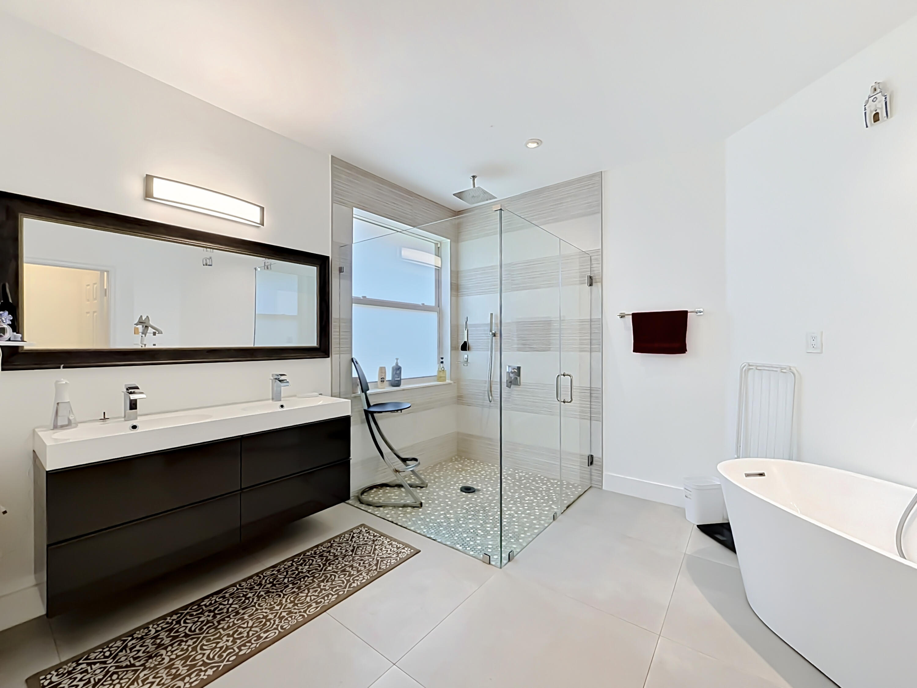 3836 Heron Ridge Lane Weston, FL 33331 - Photo 34 of 71 a bathroom with a double vanity sink mirror and toilet