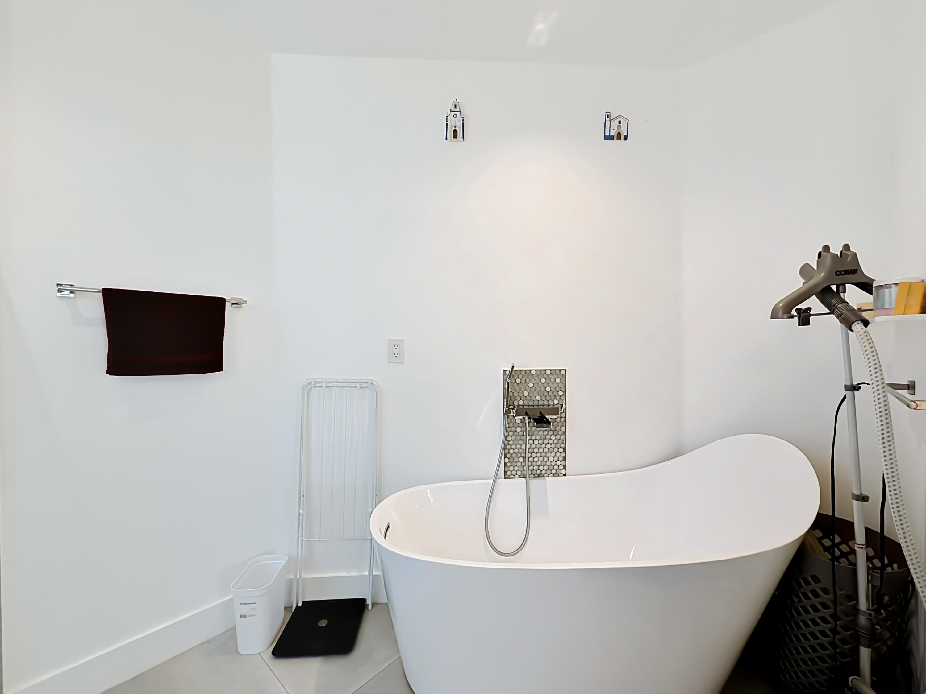 3836 Heron Ridge Lane Weston, FL 33331 - Photo 36 of 71 a white bath tub sitting in a bathroom