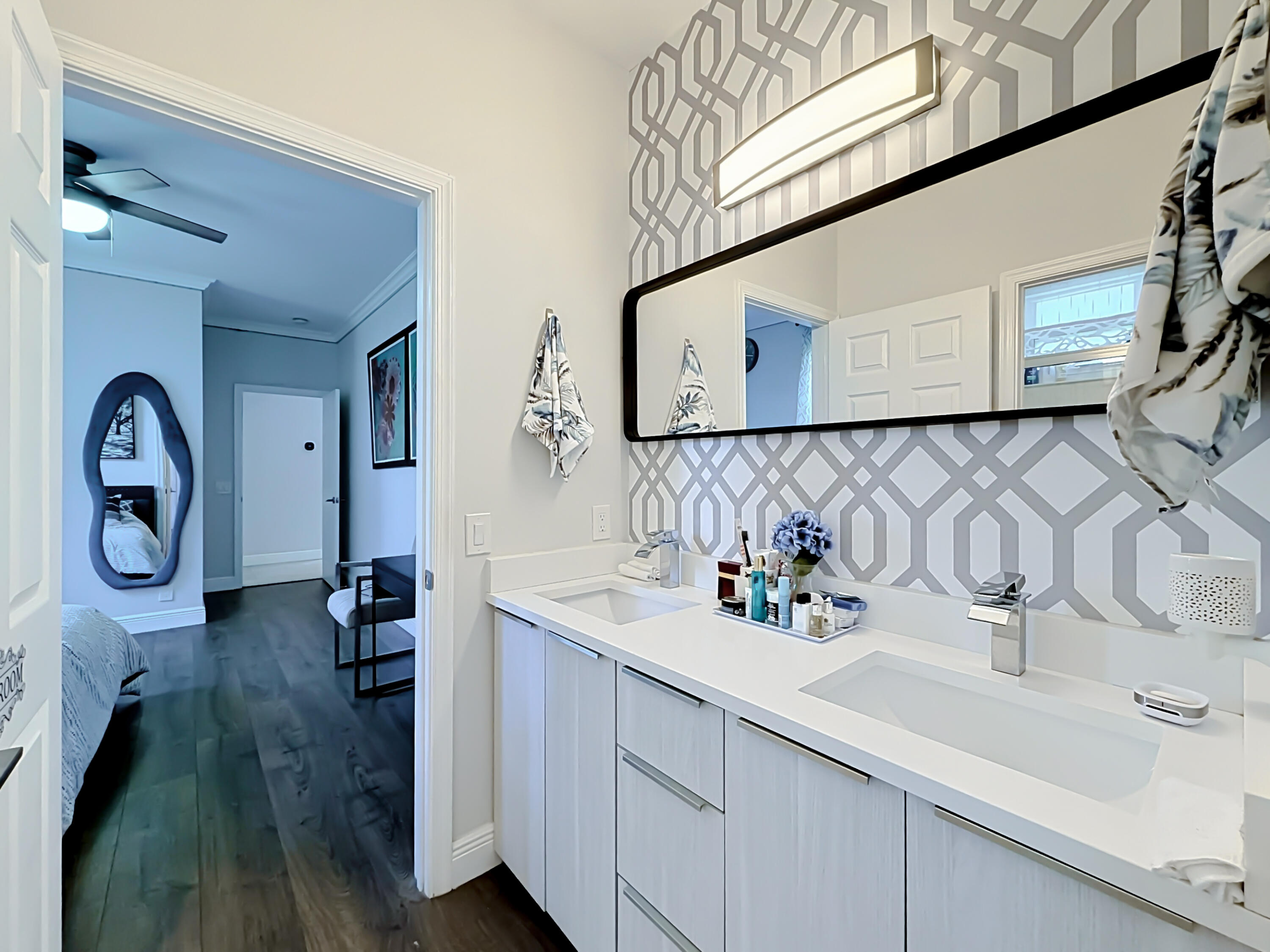 3836 Heron Ridge Lane Weston, FL 33331 - Photo 47 of 71 a bathroom with a sink and a mirror