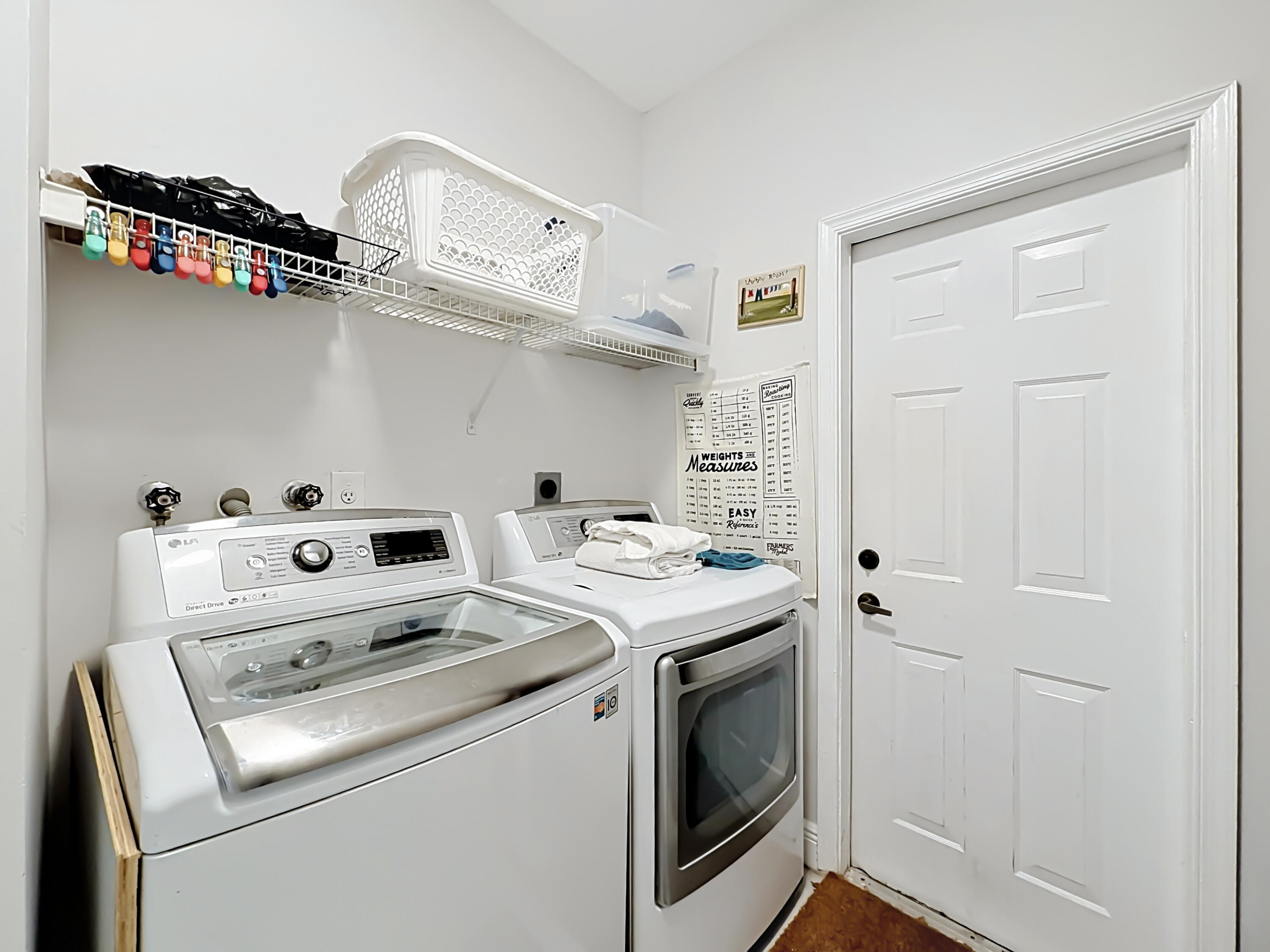 3836 Heron Ridge Lane Weston, FL 33331 - Photo 51 of 71 a utility room with dryer and washer