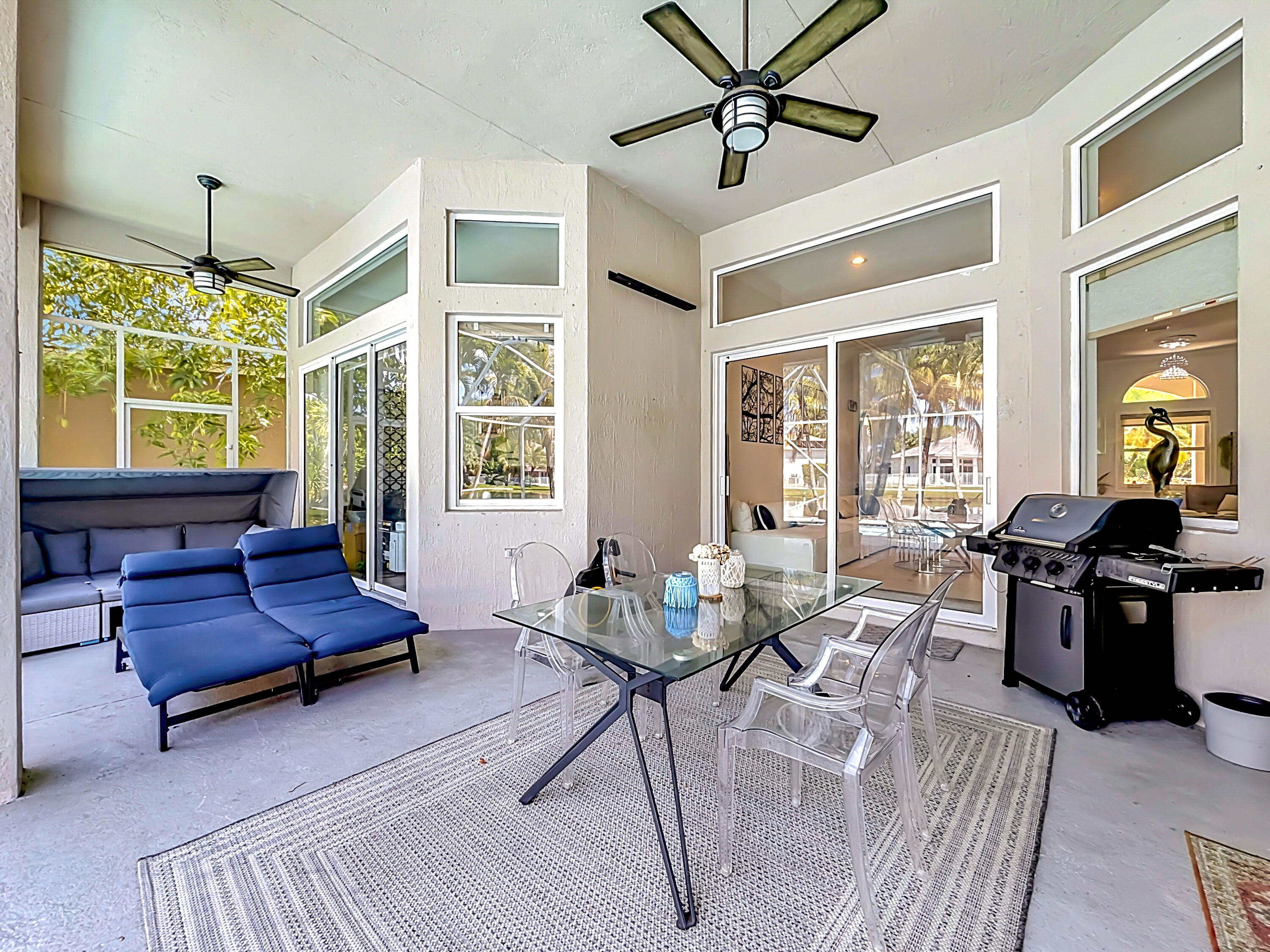 3836 Heron Ridge Lane Weston, FL 33331 - Photo 57 of 71 a living room with furniture fireplace and a large window