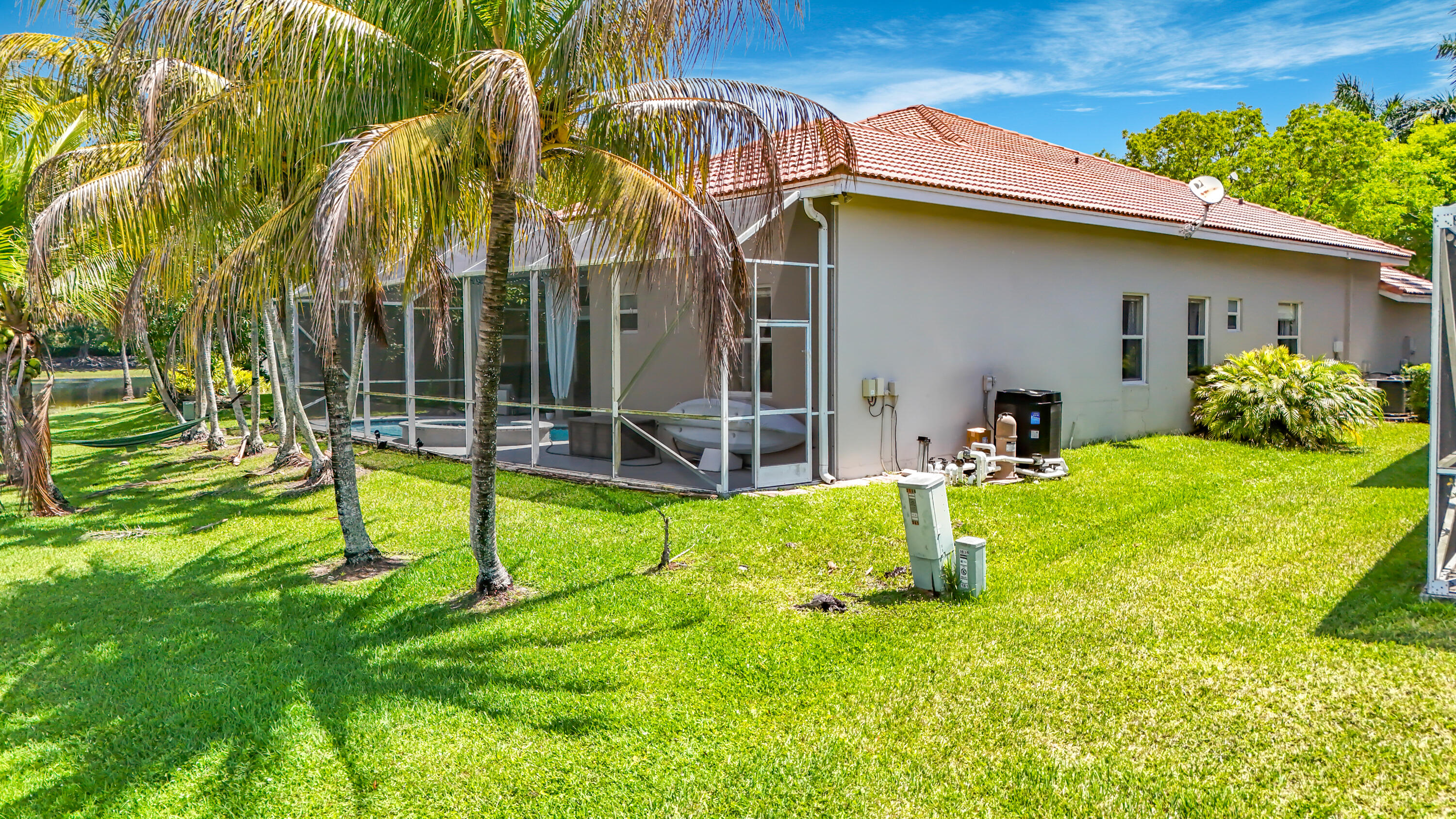 3836 Heron Ridge Lane Weston, FL 33331 - Photo 65 of 71 a house view with a backyard space