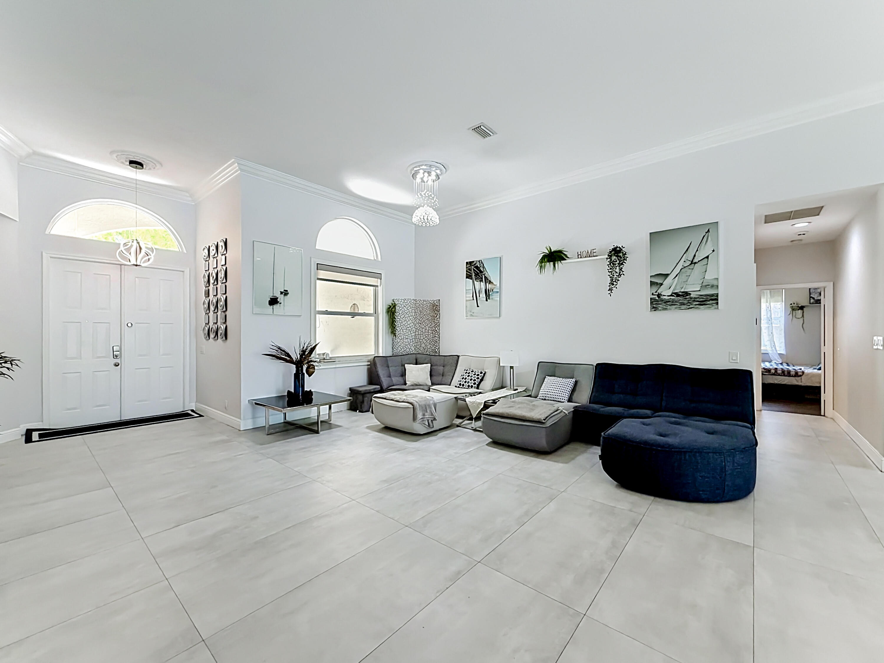 3836 Heron Ridge Lane Weston, FL 33331 - Photo 7 of 71 a living room with furniture and a lamp