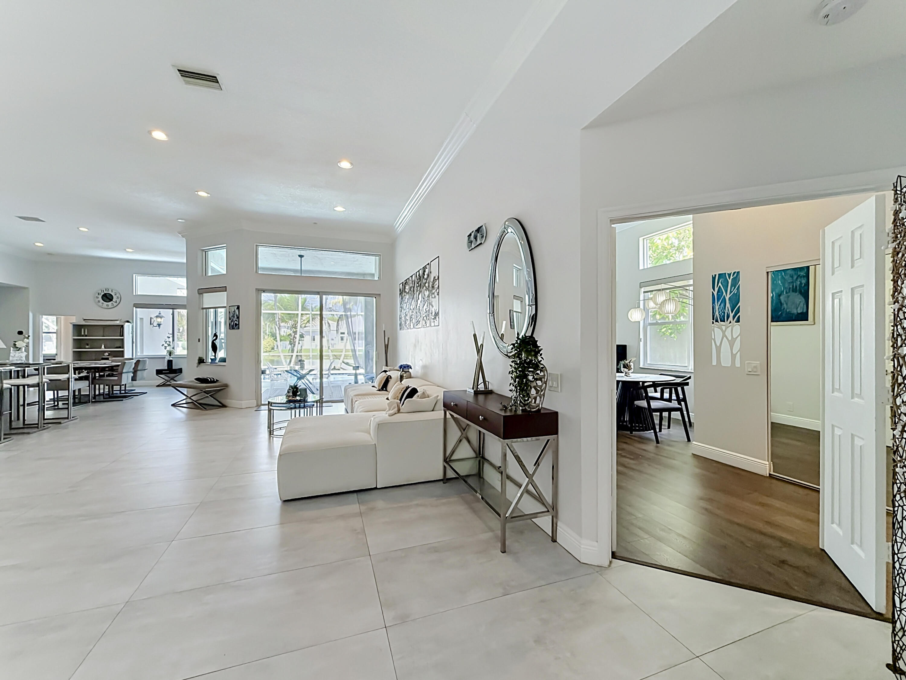 3836 Heron Ridge Lane Weston, FL 33331 - Photo 9 of 71 a living room with furniture and a table