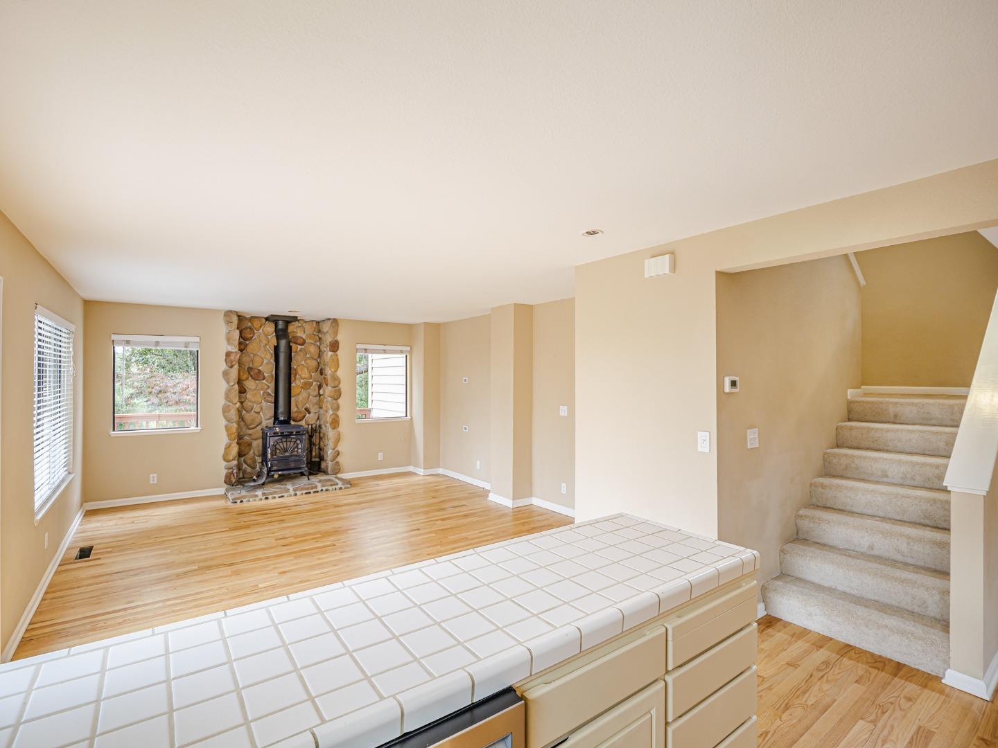 3040 Pacific Heights Drive Aptos, CA 95003 - Photo 18 of 55 a view of an empty room with window and stairs