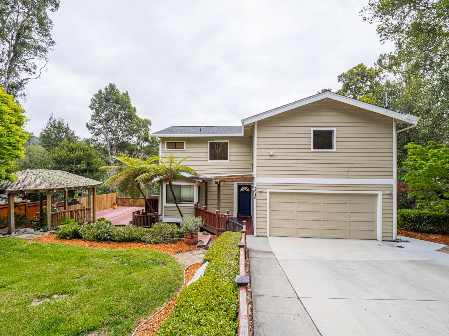 3040 Pacific Heights Drive Aptos, CA 95003 - Photo 4 of 55 a front view of house with yard and green space