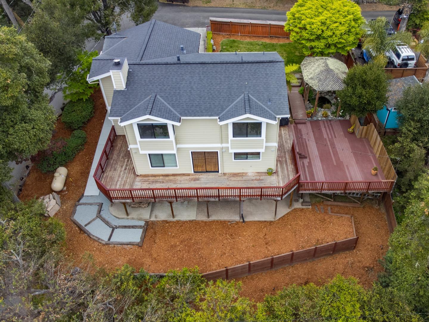 3040 Pacific Heights Drive Aptos, CA 95003 - Photo 51 of 55 an aerial view of a house with a yard and balcony