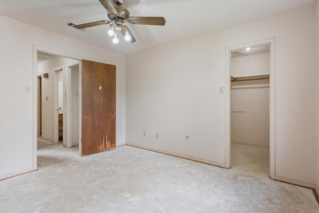 317 Chapman Road Hewitt, TX 76643 - Photo 14 of 20 Interior room with light-colored walls and a ceiling fan with iighting