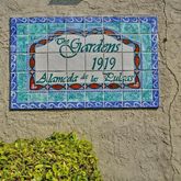 a sign on the wall of the street