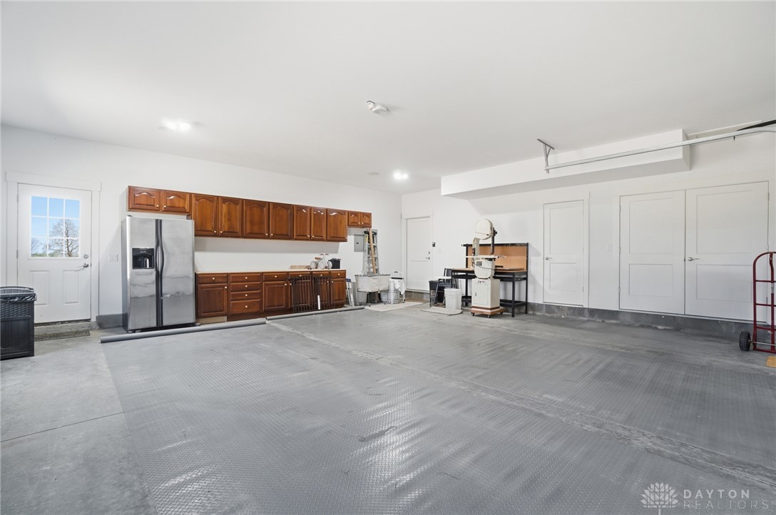 9364 Kenrick Road Dayton, OH 45458 - Photo 42 of 62 This spacious garage offers abundant storage and functional space for all your needs.