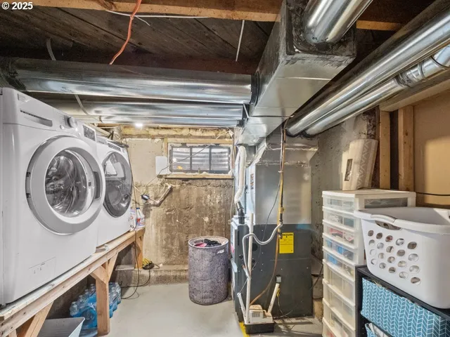 a backyard of a house with fire pit and outdoor seating