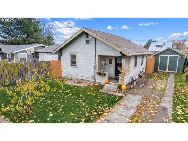 a view of a backyard with a garden