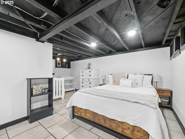a view of walk in closet with white cabinet