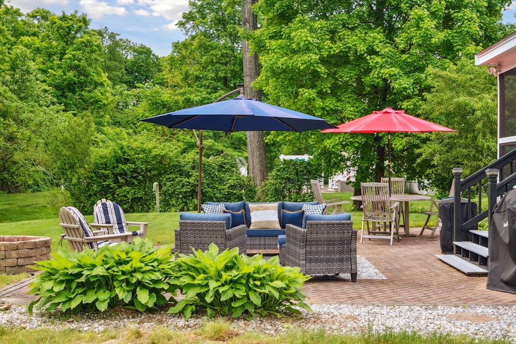 5 Maple Street Pepperell, MA 01463 - Photo 38 of 39 a view of backyard with seating space and trees