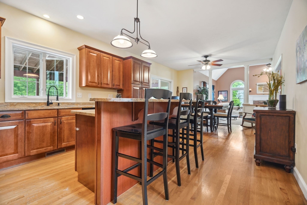 5 Maple Street Pepperell, MA 01463 - Photo 7 of 39 a view of a dining room with furniture window and wooden floor