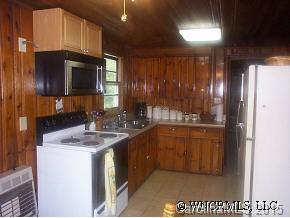 N John Shehan Road Tryon, NC 28782 - Photo 6 of 9 a kitchen with stainless steel appliances granite countertop a sink and cabinets